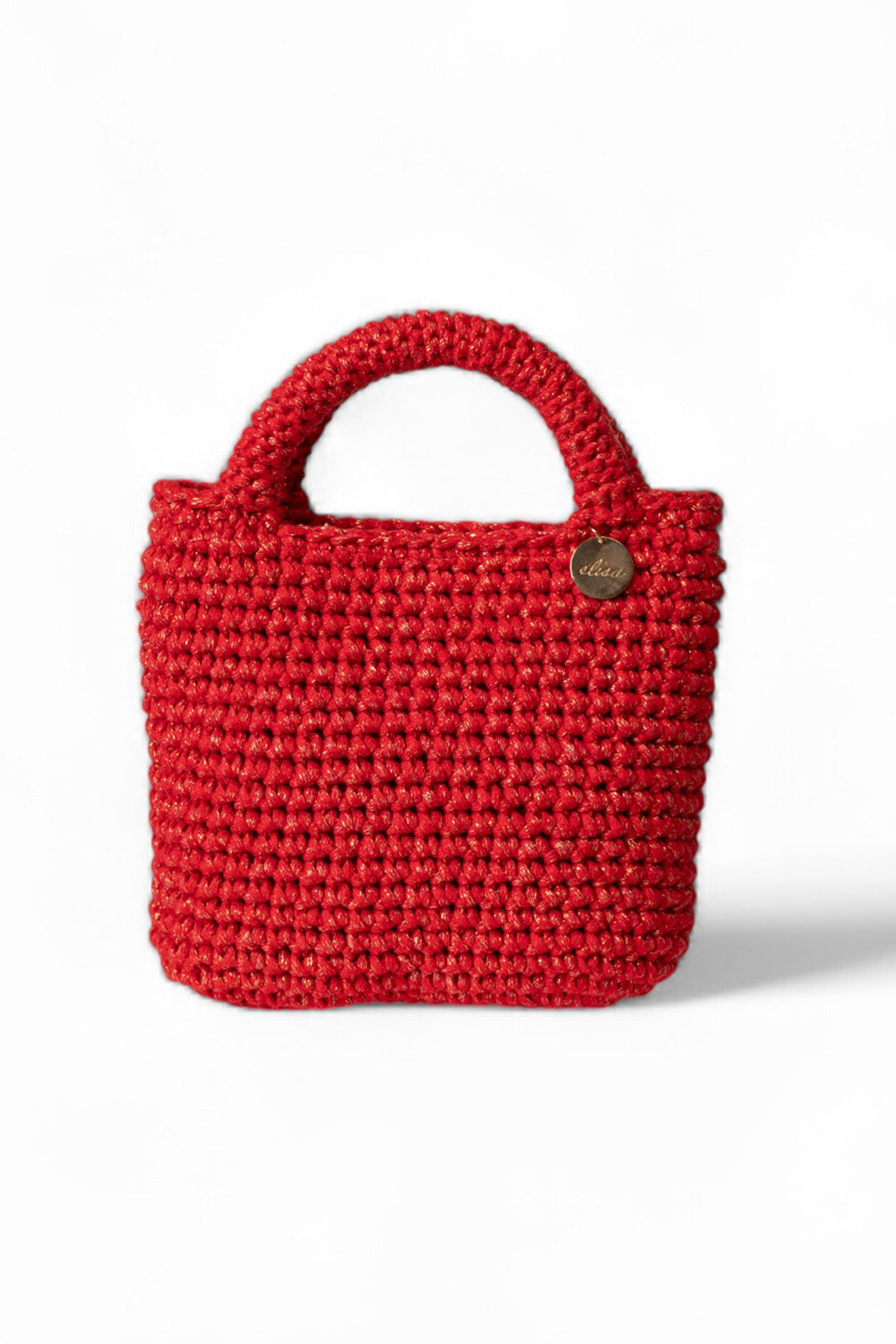 Cartera tejida color rojo metalizado.